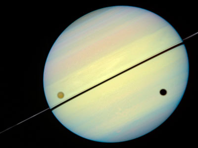 Saturn And It's Moon Titan (NASA)